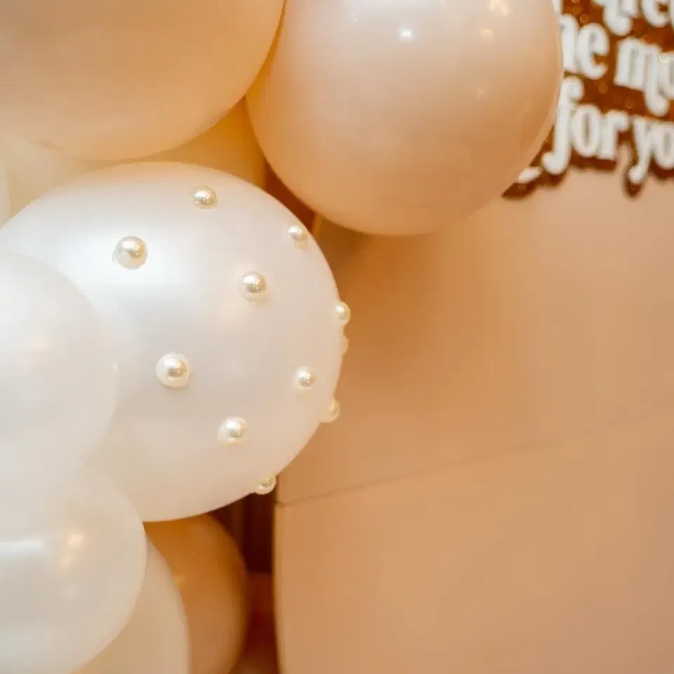 Pearl-embellished balloons